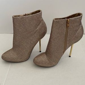 Glitter Gold ankle bootie with metallic gold heel